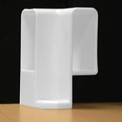 Pièce d'angle pour tablette coulissante