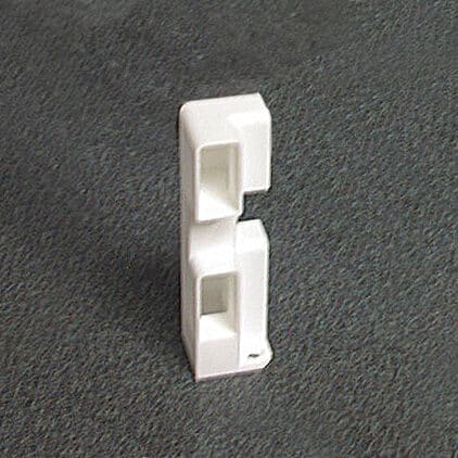 Coin double réversible pour tablette coulissante